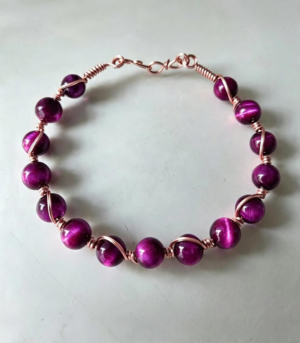 Bransoletka handmade z różowym tygrysim okiem – 19 cm na dłoni